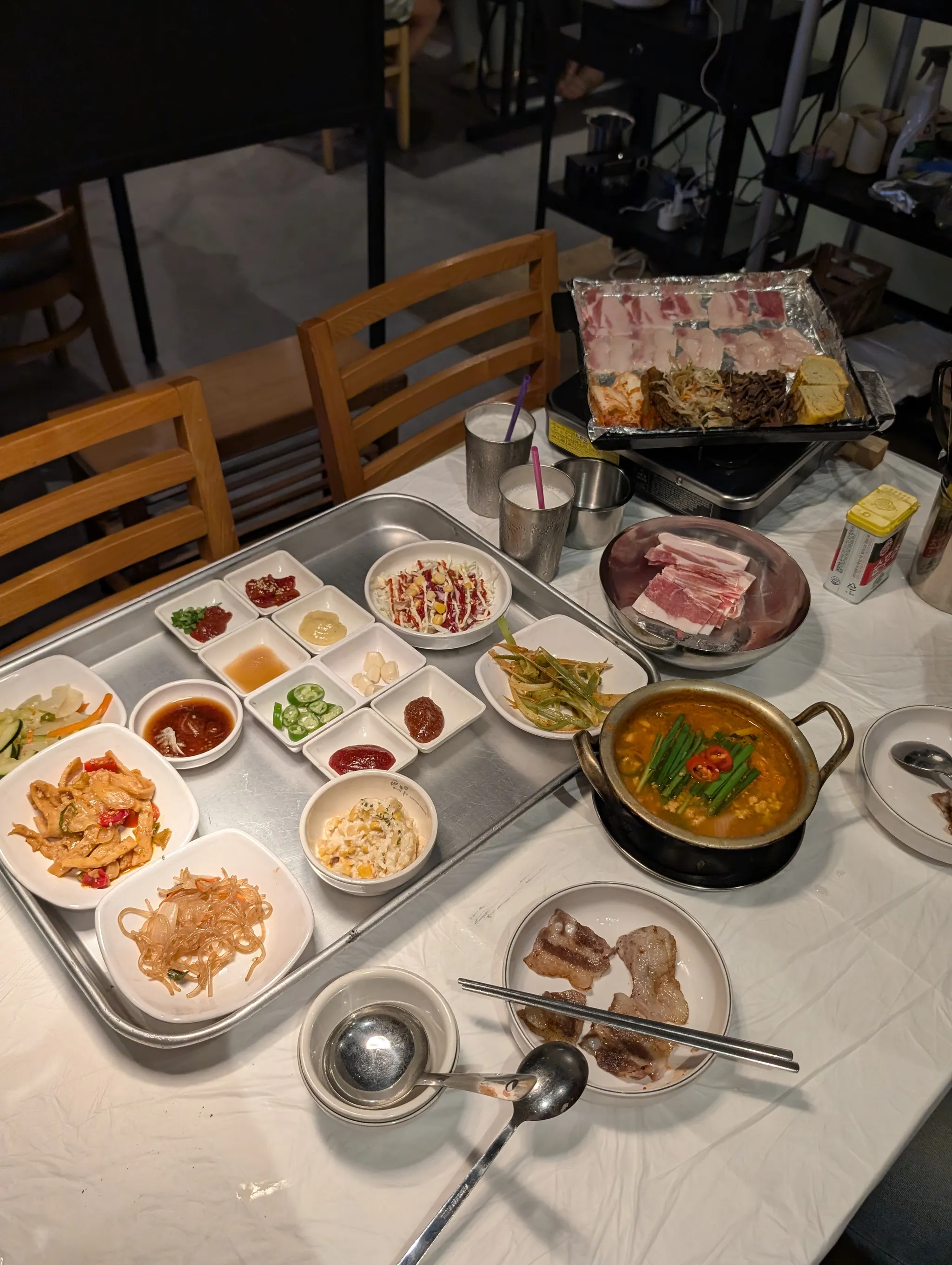 Full Korean barbecue spread with banchan at Bae Sik Dang Singapore