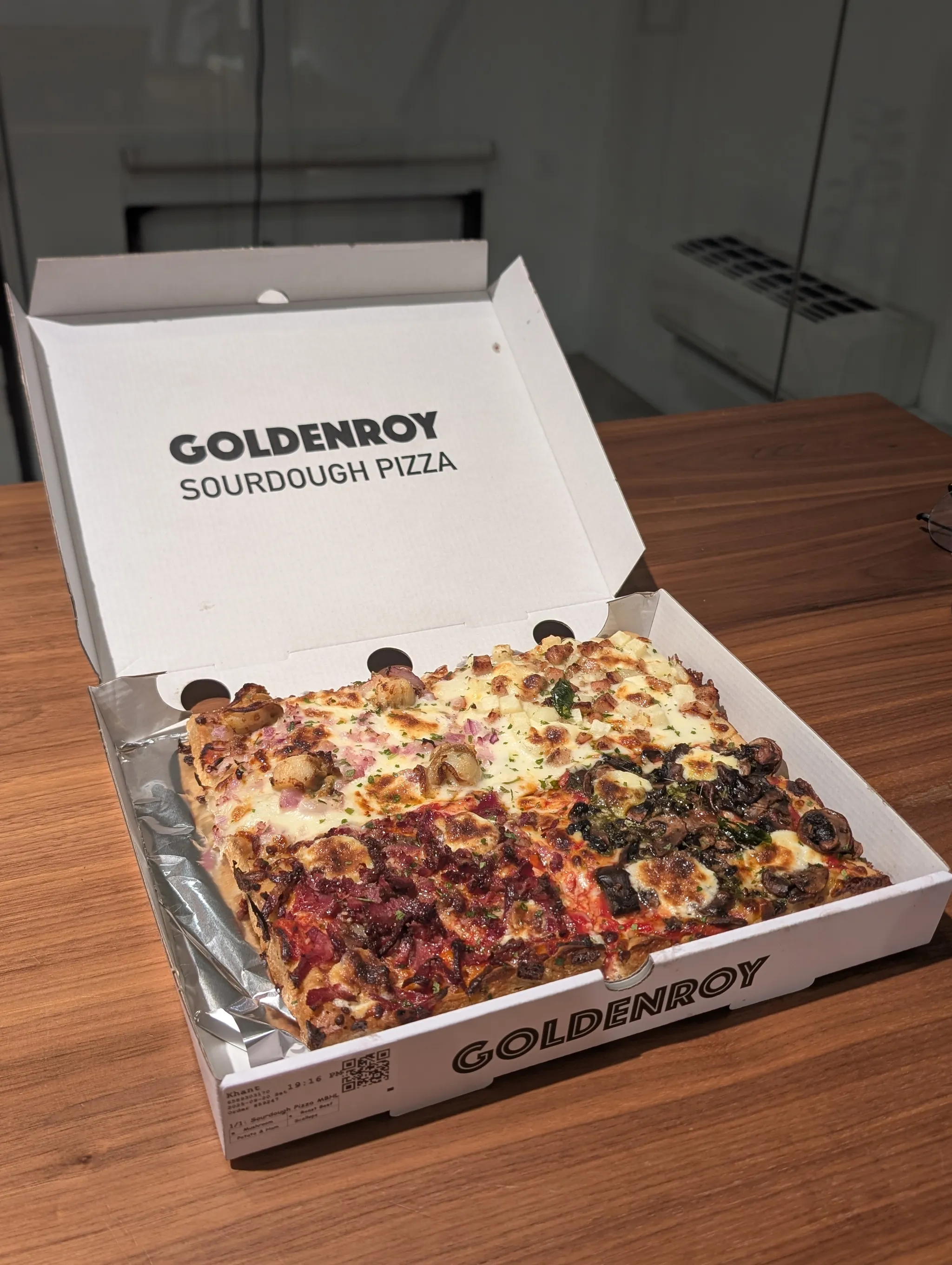 Four pieces of sourdough pizza from Goldenroy Sourdough Pizza, Singapore