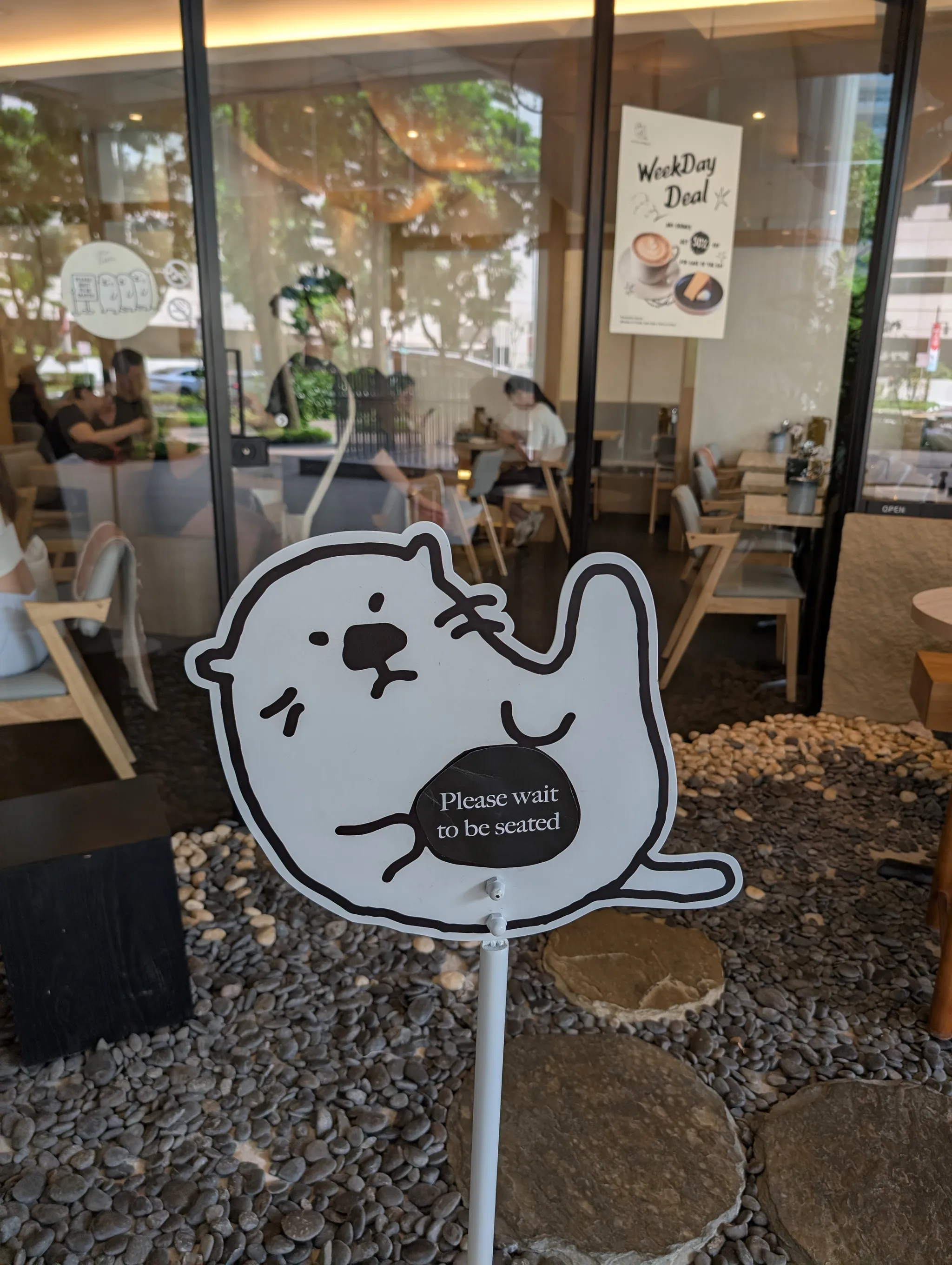 Cute otter sign from Otter and Pebbles, Singapore