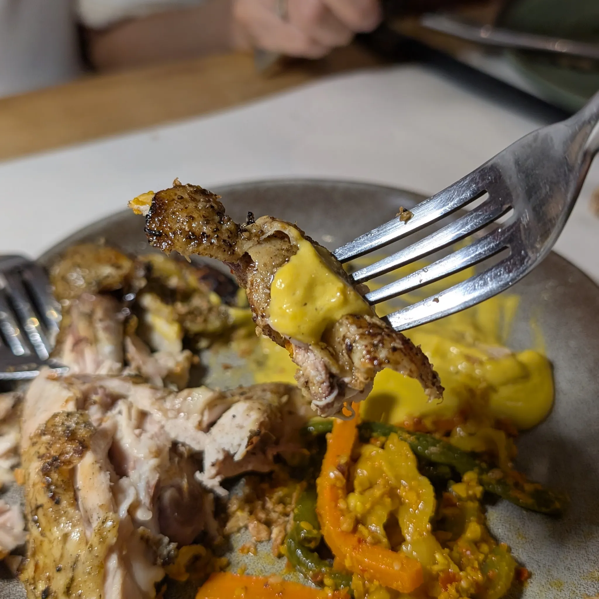A close-up shot of Grilled Chicken Leg with Pumpkin Lemongrass Cream, Nyonya Acar, Butter Glaze from Psychotic Operator, Selangor, Malaysia