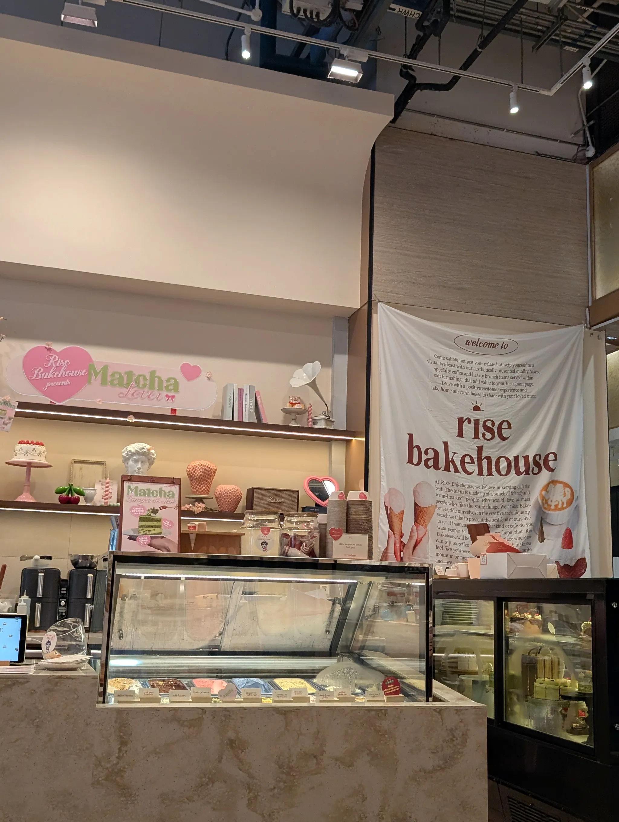 Interior of Rise Bakehouse TripleOne Somerset, Singapore featuring the Matcha Sakura campaign